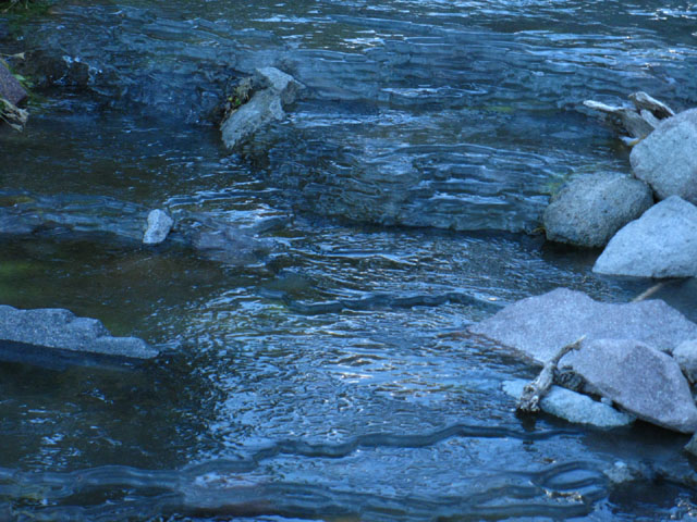 Wolf Creek frozen into layers of slush, Carson Iceberg Wilderness on the PCT.